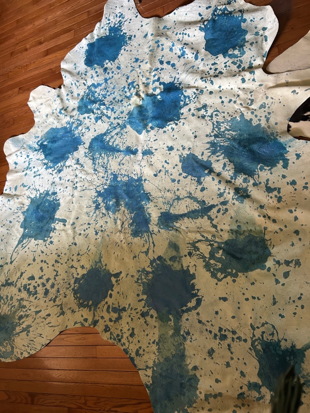 Hand-Painted Cowhide Rug with Blue Splatter - Picture 5 of 5